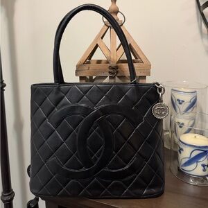 CHANEL Black Quilted Leather Tote with Interlocking CC Charm